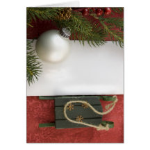 Trineo del verde de la tarjeta de Navidad
