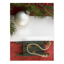 Trineo del verde de la tarjeta de Navidad Postal