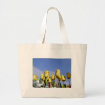 Tulipanes amarillos que brillan bolsa de mano