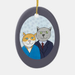 Un ornamento muy bonito de los pares del gatito ornamentos para reyes magos