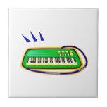 Un verde keytar con un gráfico azul de la correa, azulejo