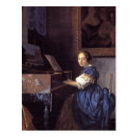 Una señora Seated en el Virginal Postal