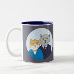 Una taza muy bonita de los pares del gatito