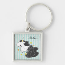 Unicornio negro del dibujo animado con llavero de 