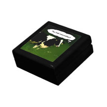 Vaca divertida - usted mira la caja de regalo de l