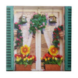 Ventana italiana soleada con los girasoles y el bi teja  ceramica