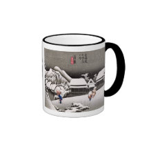 Viajeros en la nieve en la estación de Kanbara Taza
