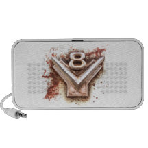 Vieja insignia oxidada de V8 del cromo de un coche Mp3 Altavoz