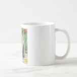 Yorkie en la impresión del arte de los tulipanes taza