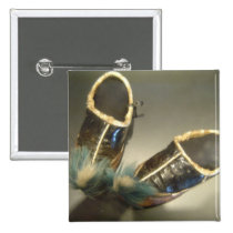 Zapatos del superviviente botones