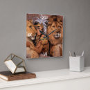 Buscar león relojes de pared Leona