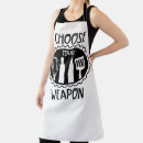 Buscar el arma delantales General y unisex