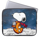 Buscar astronauta electronica Charlie brown