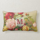 Buscar flores amarillas rojas cojines Para ella