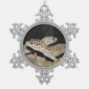 Buscar leopardo adornos Lagarto