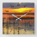 Buscar reflejo relojes de pared Puesta de sol