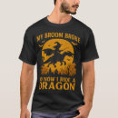 Buscar bruja en la escoba camisetas General y unisex