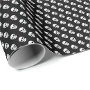 Buscar calaveras papel de regalo Halloween