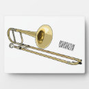 Buscar instrumentos musicales placas fotograbadas Música
