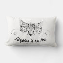 Buscar gatito dormido cojines Gato