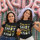 Buscar trago camisetas Para ella