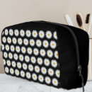 Buscar flores negras bolsas cosmetica General y unisex