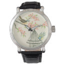 Buscar pájaros relojes Flor