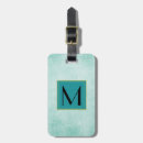 Buscar papel etiquetas para maletas Monograma