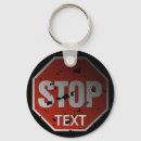 Buscar stop llaveros Advertencia