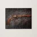 Buscar pistolas puzzles Arma