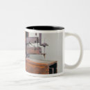 Buscar máquina de coser tazas Modelo