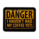 Buscar apenado imanes Café