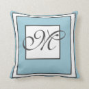 Buscar letra e cojines Familia