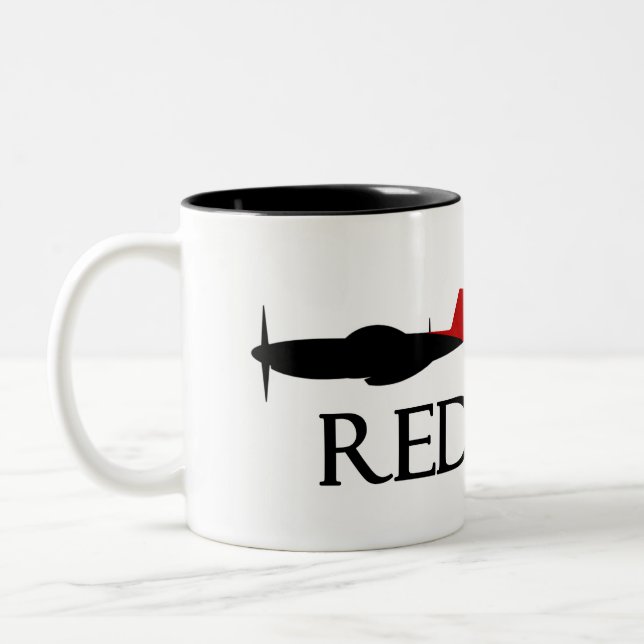 100o Taza de la herencia de las "colas rojas" del (Izquierda)