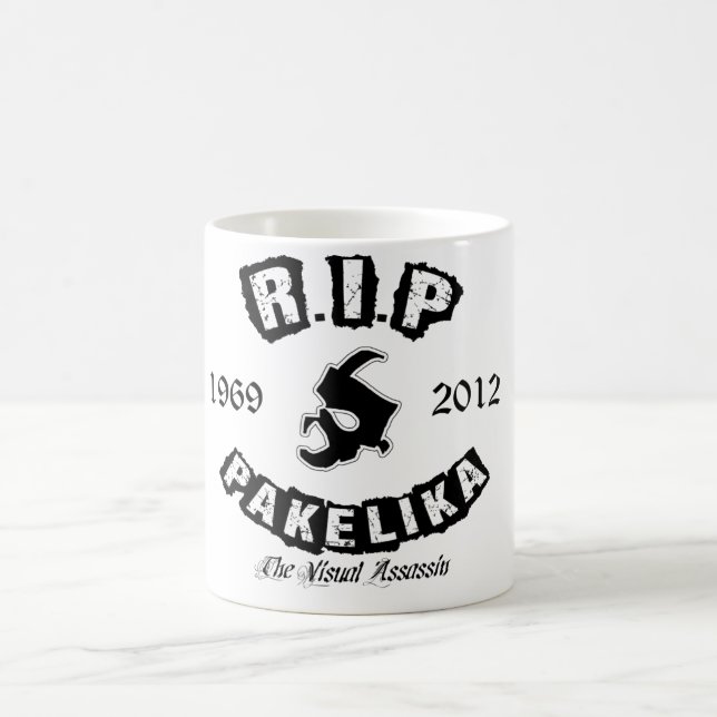 11 onzas. Taza del tributo de Pakelika (Centro)
