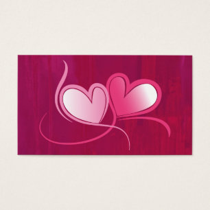 2 corazones bailando sobre fondo rosa Fuschia