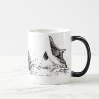 3 orcas que juegan la taza Morphing