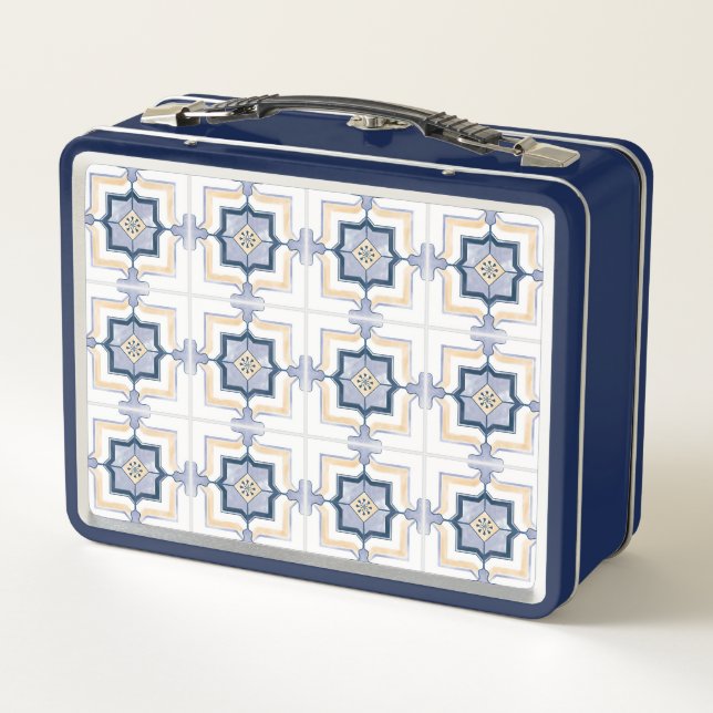 A blue and white metal lunchbox with a geometric  (Reverso)