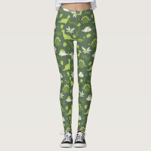 A con leggings de dinosaurios