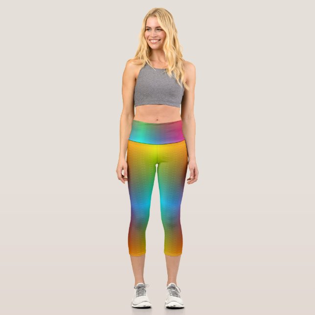 A person wearing vibrant, rainbow-gradient legging (Anverso)