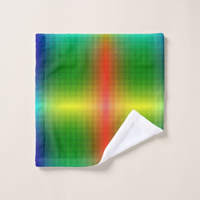 A towel set and washcloth display vibrant rainbow  (Toallita)