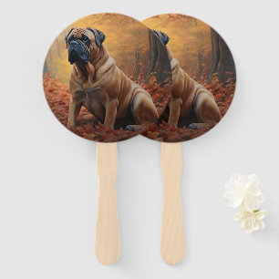 Abanico Bullmastiff en hojas de otoño caídas inspiran