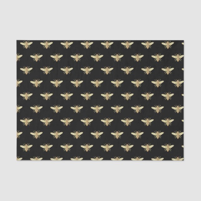 Abeja de oro metálico sobre papel de tejidos negro (Anverso)