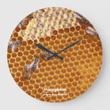 Abejas de miel en la colmena reloj grande