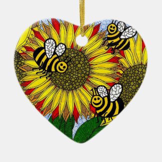 Abejorros y ornamento de los girasoles