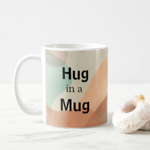 Abrazo en una taza de café