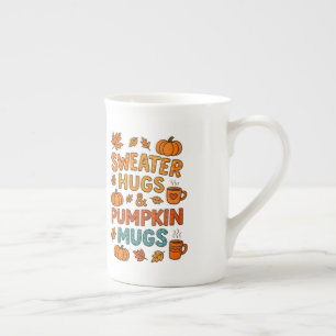 Abrazos de sudadera y tazas de calabaza Tipografía