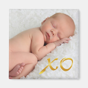 Abrazos y besos en un imán de fotos para bebés c