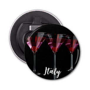 Abrebotellas Cócteles rojos en vidrio martini con cereza