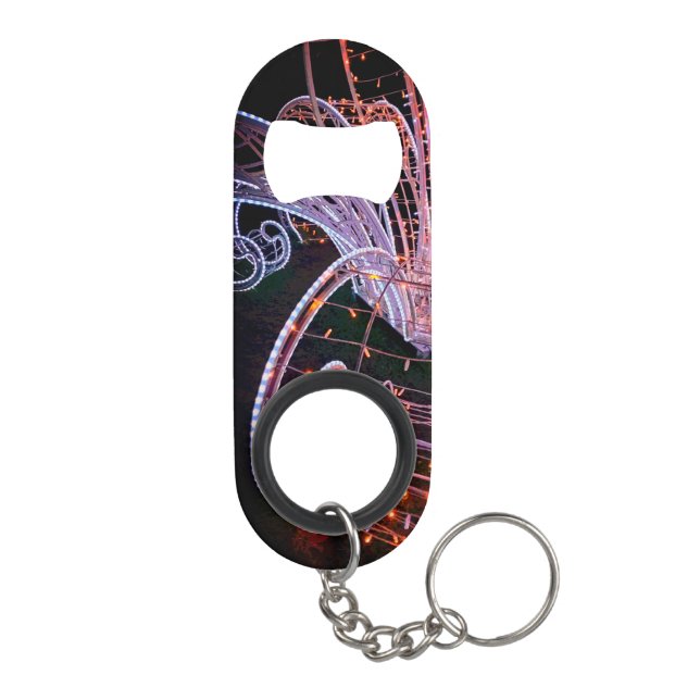 Abrebotellas De Llavero Giro rosa (Reverso
)